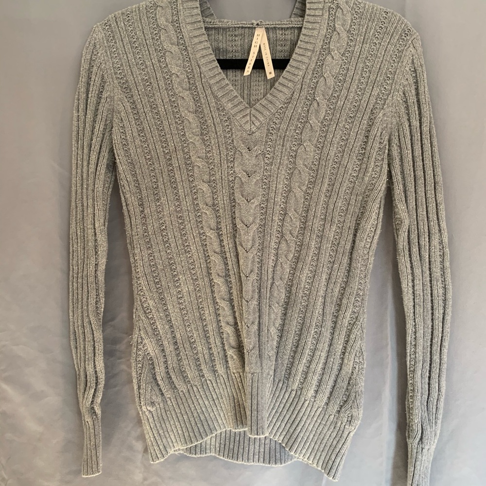 Woman’s knitted pullover sweater
